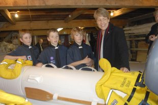 ARC Finance Chairman  Wyn Hoadley gets some advice from the Sea Scouts on Safety.